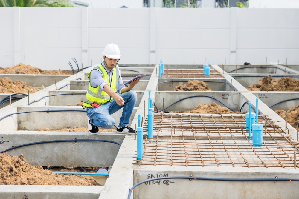 construction-worker-inspecting-foundations